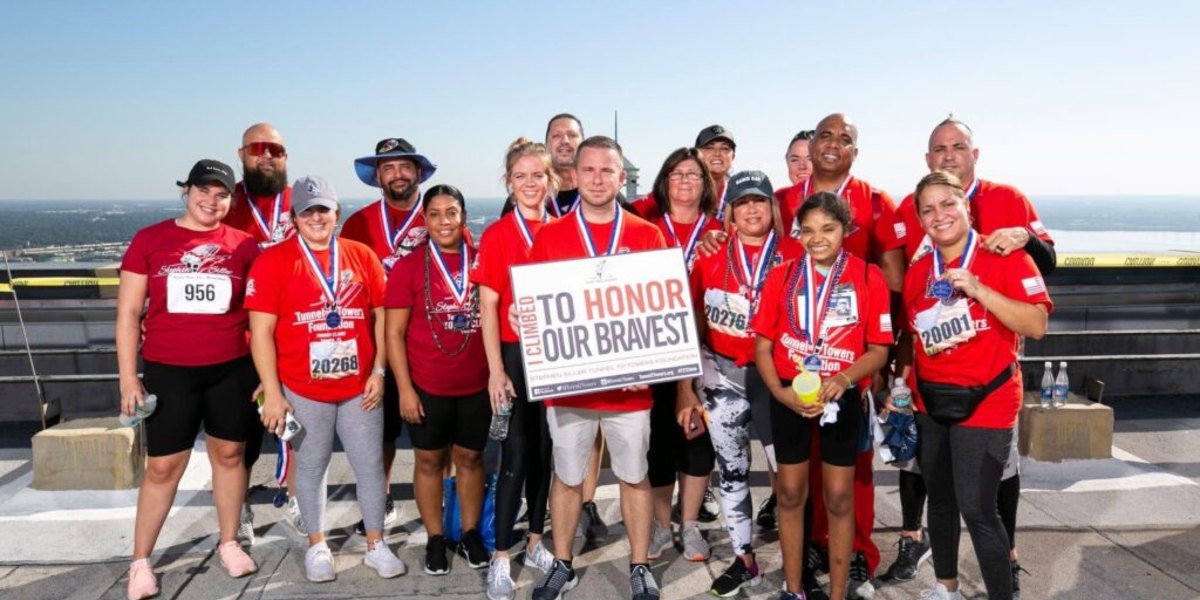 The T. Disney Trucking team at the top of the Tunnel to Towers Tampa tower climb