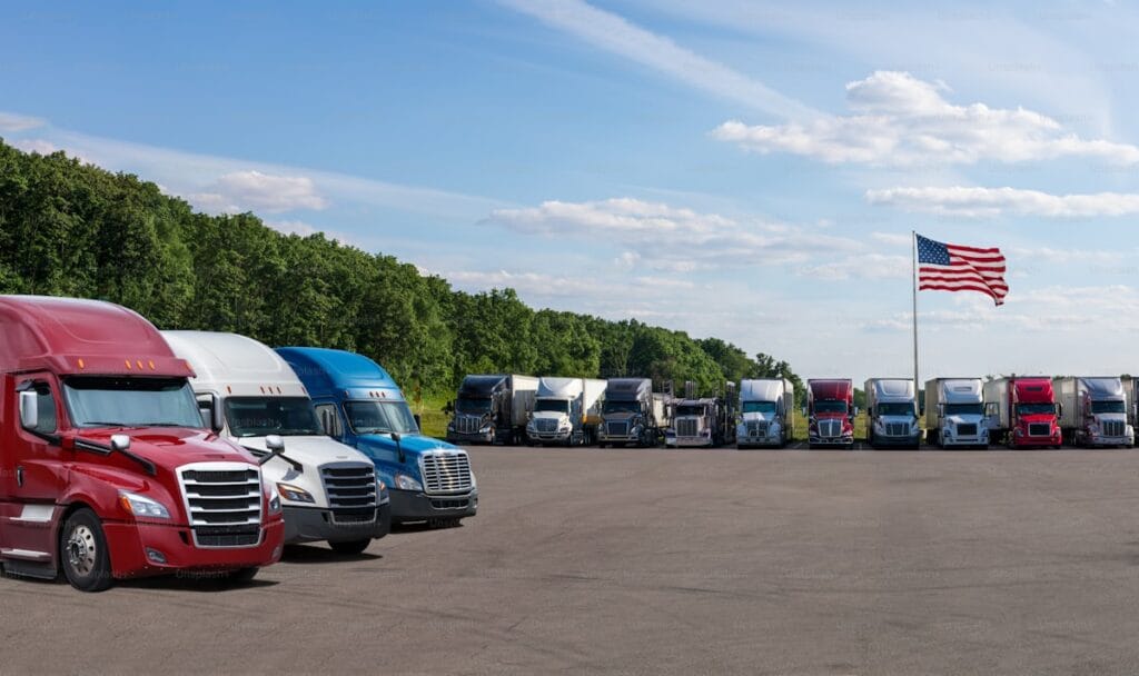 Trucks parked at rest stop along highway